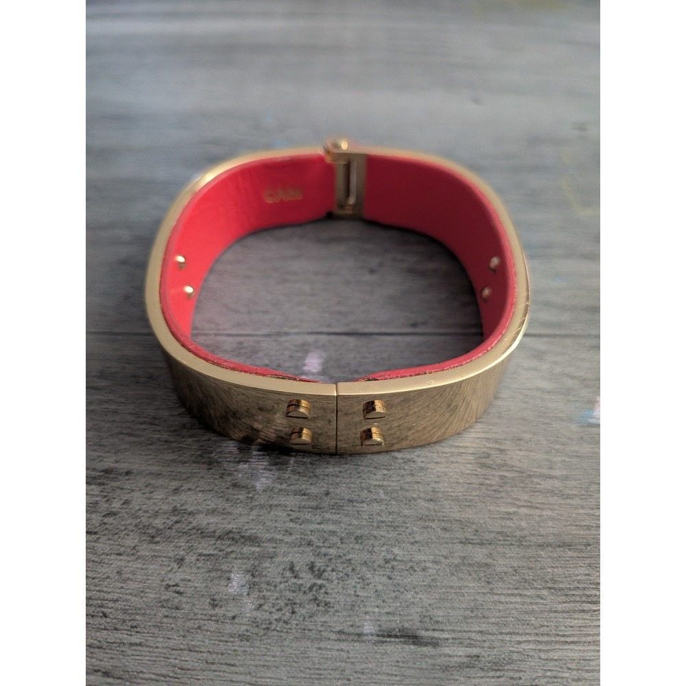 Cabi Gold Tone Hinged Cuff Bracelet with Red Leather Lining Stud Detail